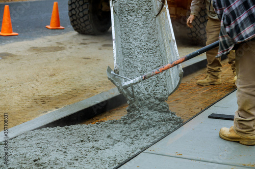 Worker working for concrete pavement for ground flooring construction