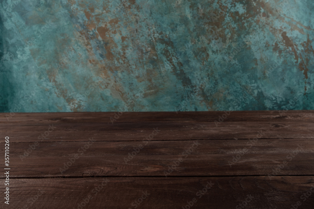 Image of wooden table in front of blurred background. Empty wooden table platform over background for present product. Image of wooden table in front of blurred background. Empty wooden table platform over background for present product.