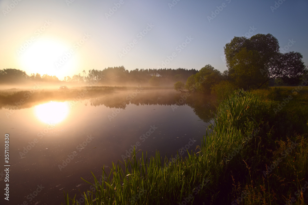 morning fog on the river. sunrise over the lake. morning fog on the river. sunrise over the lake.