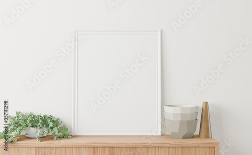 Home interior poster mock up with frame on the cabinet and white wall background. 3D rendering. © Thanet
