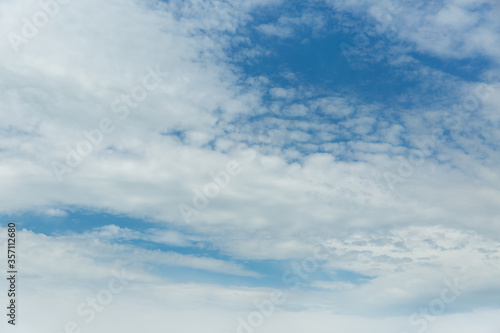 Blue sky and cloud background. © Kot63
