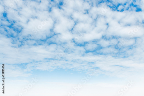  Light white clouds on blue sky. A beautiful background. 