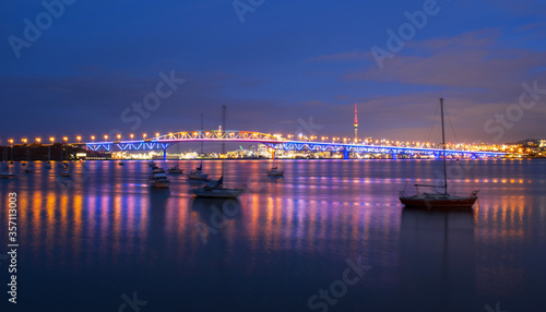 Night View to the Iconic Harbour Bridge Auckland New Zeland; Light Performance seeing from Birkenhead Wharf