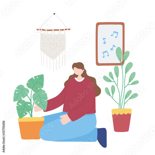 stay at home, girl takes care for houseplants, self isolation, activities in quarantine for coronavirus