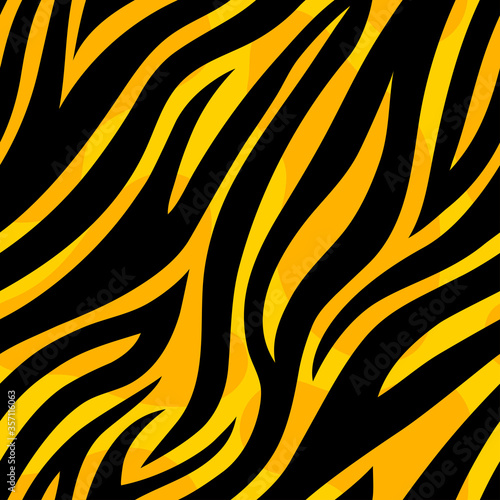 Fototapeta Naklejka Na Ścianę i Meble -  Trendy yellow tiger seamless pattern. Hand drawn fashionable wild animal skin texture for fashion print design, fabric, textile, wrap, background, wallpaper. Vector illustration