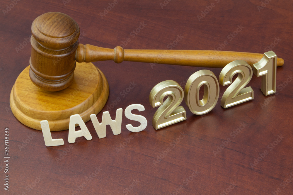 Judge gavel and numbers 2021. Concept new laws in year 2021. Judge gavel and numbers 2021. Concept new laws in year 2021.