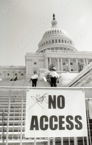 No Access sign and police officers in front of the U.S. Capitol Building black and white photograph
