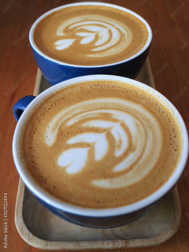 An image of a cup of cappuccino. Latte art. An image of a cup of cappuccino. Latte art.