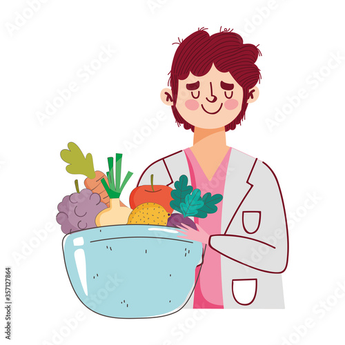 dietitian doctor with dish bowl with fruits and vegetables, fresh market organic healthy food