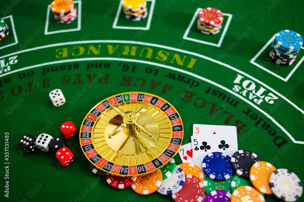 Casino equipment placed on the green floor for risky gambling for the people who want to get rich. Casino equipment placed on the green floor for risky gambling for the people who want to get rich.