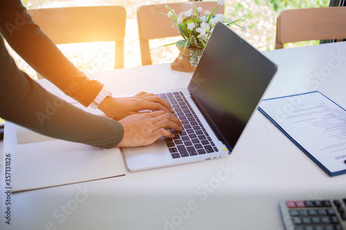 Business women are typing meeting minutes for presentation to executives.concept