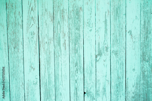 Tourquoise aged wooden plank background. Textured wooden fence.