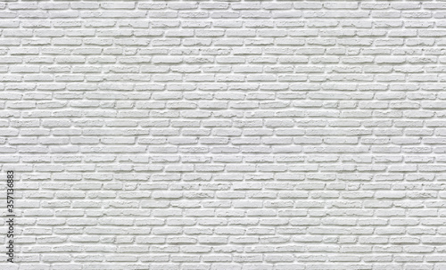 the seamless pattern or texture of the white wall of bricks use for background or backdrop