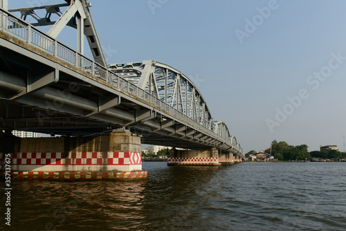 Krung Thon Bridge or Saphan Sang Hi has 6 spans, and consists of a steel superstructure resting on concrete piers, over the Chao Phraya river in Bangkok, Thailand. © ULTRAPOK