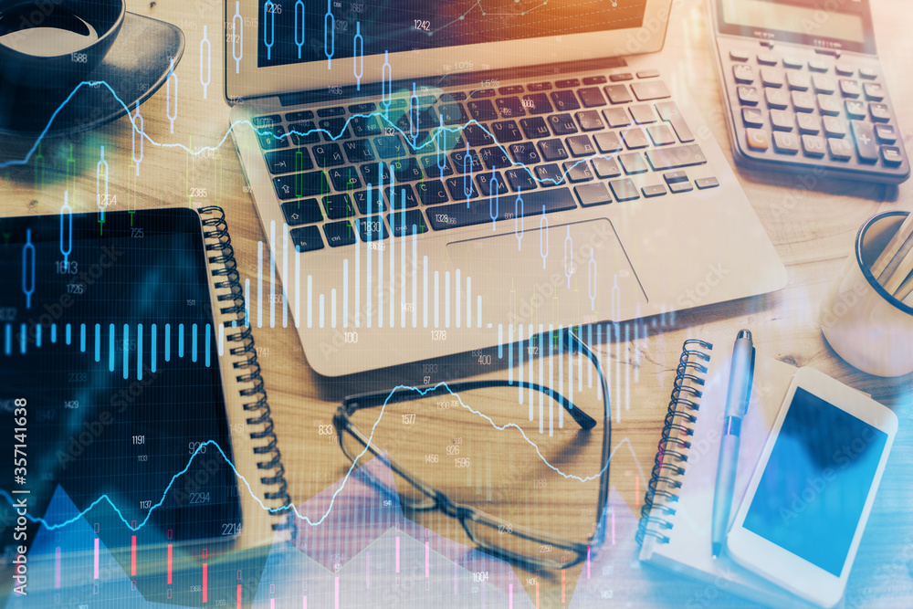 Double exposure of forex chart and work space with computer. Concept of international online trading. Double exposure of forex chart and work space with computer. Concept of international online trading.