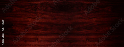 Dark cherry wood texture, wooden background. Top view