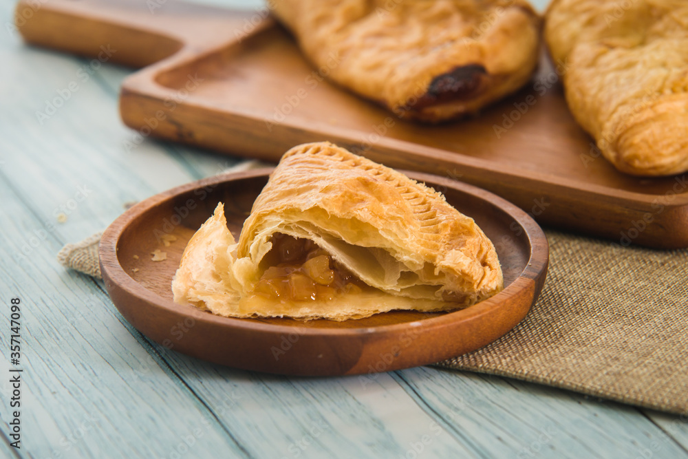 Pie apple dessert homeade cooking bakery put on the wood plate, food in coffee time.