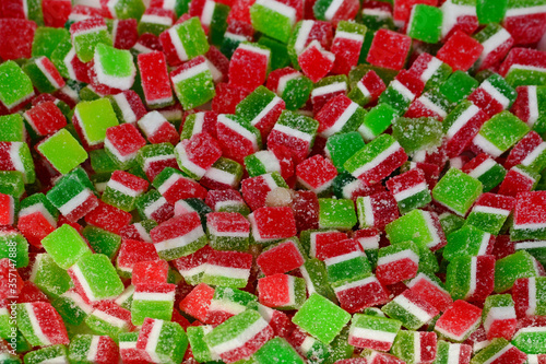Colorful sugar coated jelly sweets - red white and green colors