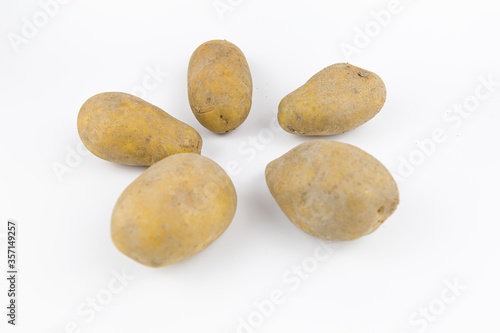 Raw potato isolated on white background.