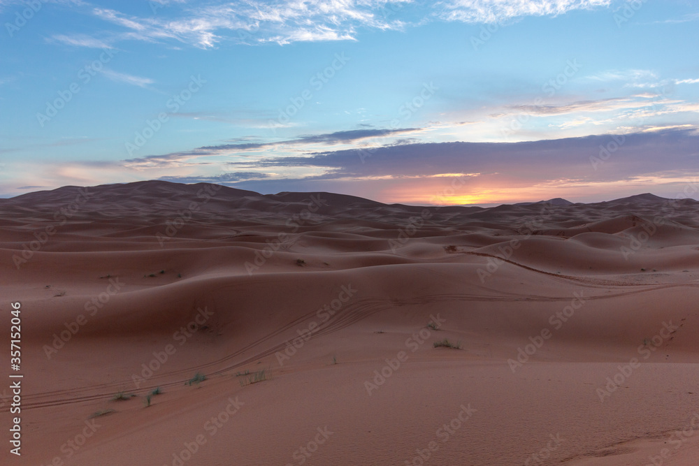landscape at sunset in sahara desert