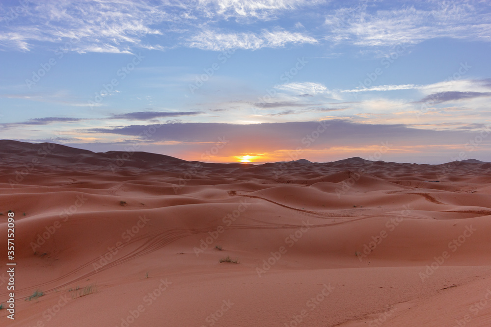 landscape at sunset in sahara desert