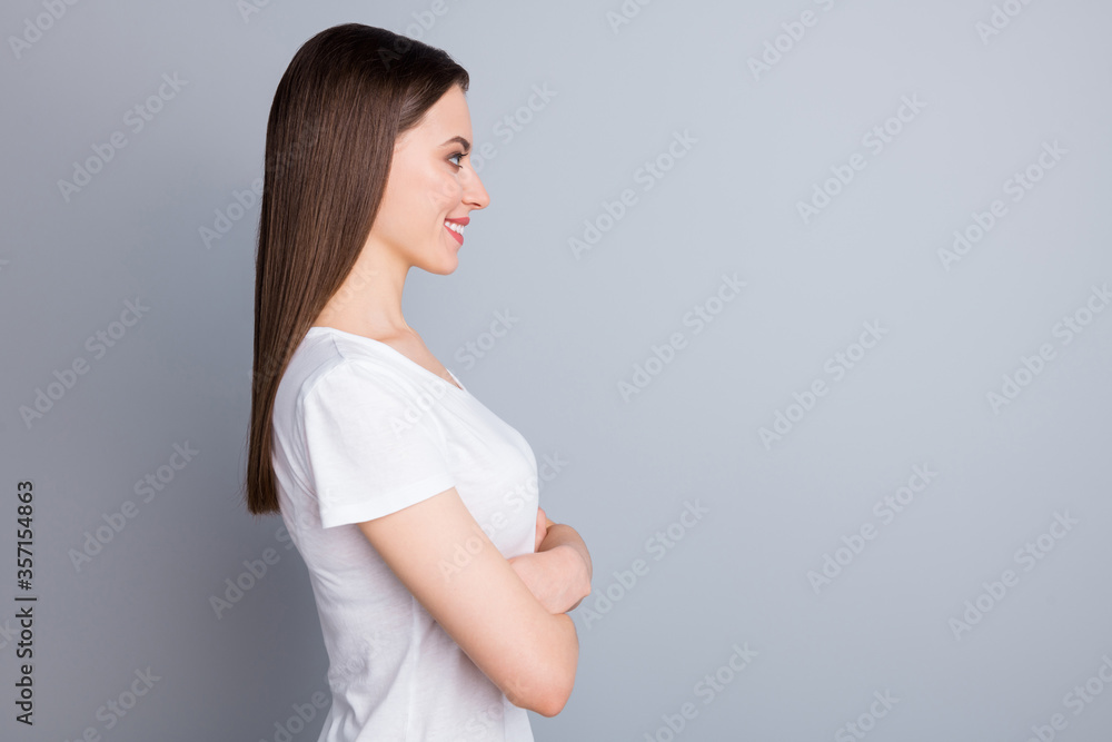 Profile photo of attractive lady arms crossed bossy person self-confident worker company representative look side empty space wear casual white t-shirt isolated grey color background Profile photo of attractive lady arms crossed bossy person self-confident worker company representative look side empty space wear casual white t-shirt isolated grey color background