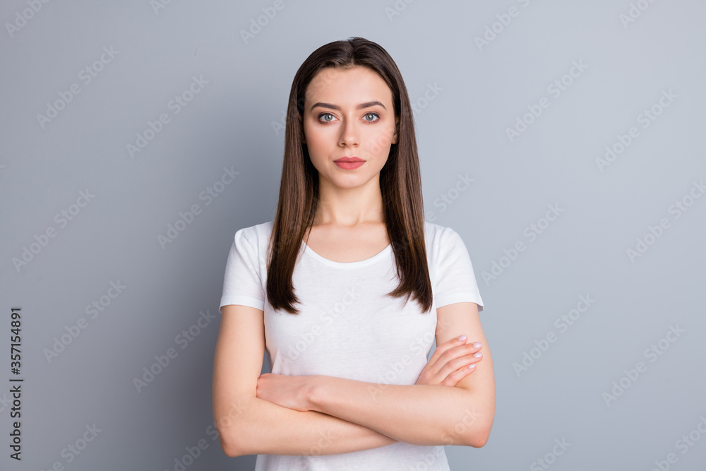Close-up portrait of her she nice attractive lovely pretty cute content serious girl freelancer folded arms isolated over grey pastel color background Close-up portrait of her she nice attractive lovely pretty cute content serious girl freelancer folded arms isolated over grey pastel color background