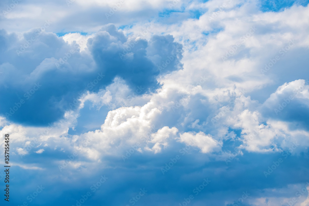 Obraz premium Heavenly blue sky with white clouds background