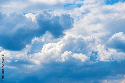 Heavenly blue sky with white clouds background