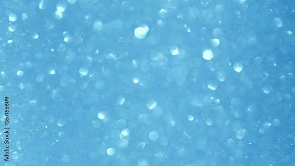 Beautiful abstract blue blurry video circular bokeh background. Beautiful abstract blue blurry video circular bokeh background.