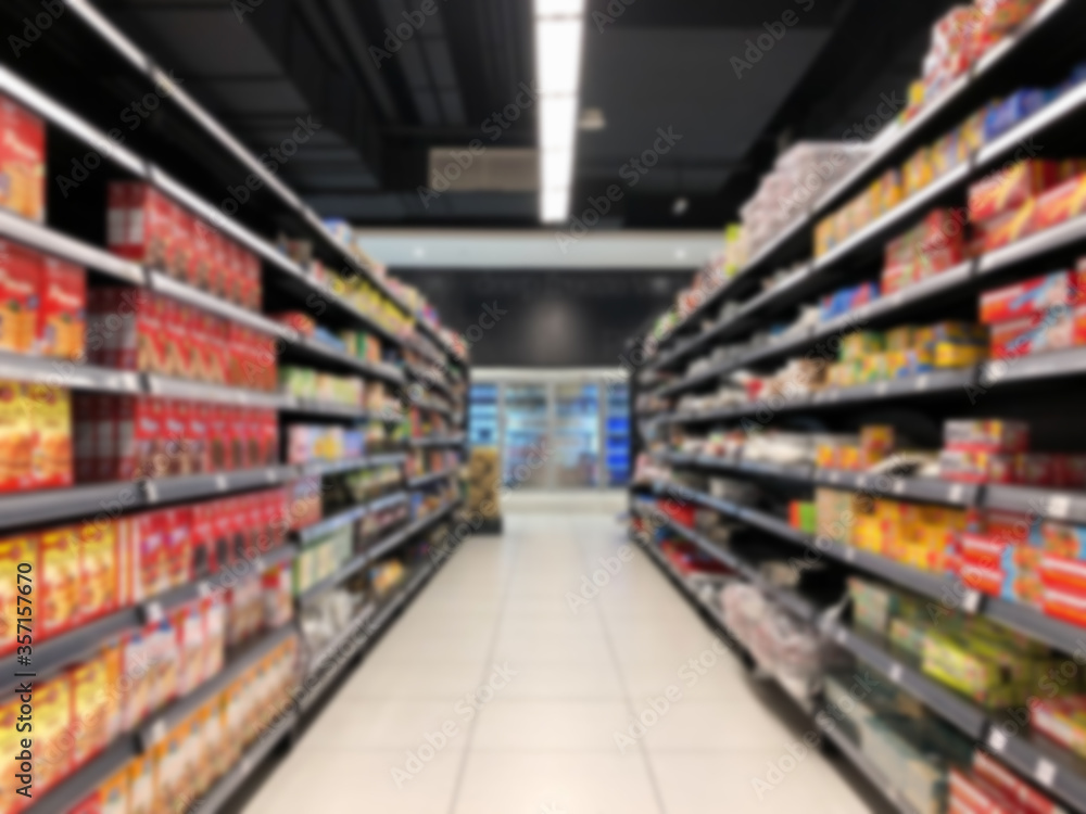 Row of shelf at hypermarket in blurred background