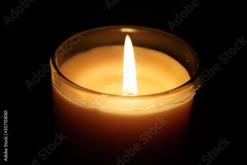 Natural candle light on a black background 