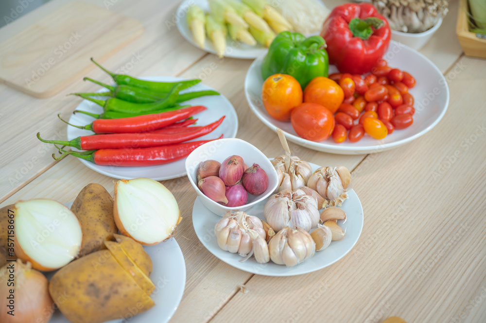 Fresh vegetable and fruit on wooden table in kitchen Fresh vegetable and fruit on wooden table in kitchen