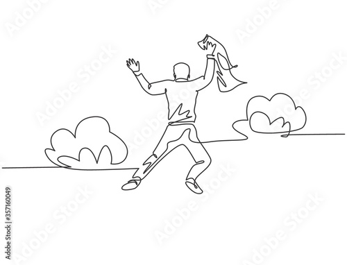 One line drawing of young happy and energetic business man stretch out his hands into the air and jumping over the cloud. Business celebration concept continuous line draw design vector illustration