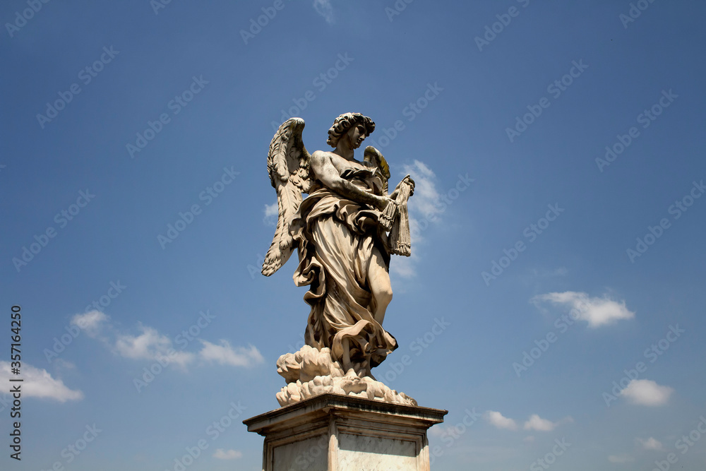 Rome's Angel statue with sky background at St. Angelo bridge Rome