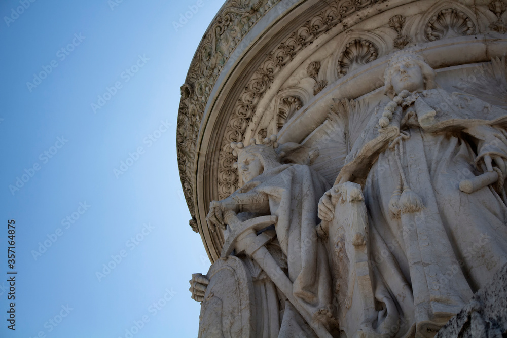 Close up view of statues in front of Altar of the Fatherland in Rome. Grand marble, classical temple honoring Italy's first king & First World War soldiers.