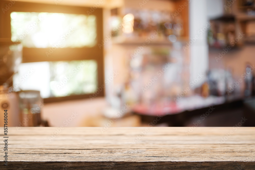Empty desk space platform over blurred restaurant or coffee shop background for product display montage. Empty desk space platform over blurred restaurant or coffee shop background for product display montage.