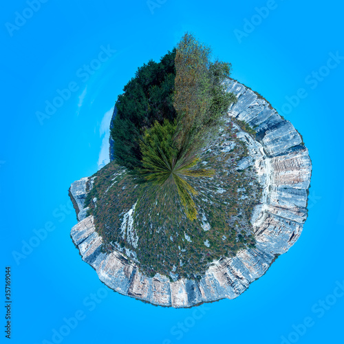 A small planet in the transformation of spherical panoramas on 360 degrees. Spherical abstract view from the height of bird flight. Curvature of space.