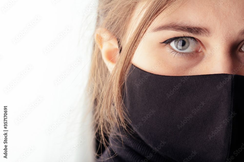 part face of sad young woman in a black stylish mask , fashion and life 2020 under quarantine and epidemic, part face of sad young woman in a black stylish mask , fashion and life 2020 under quarantine and epidemic,