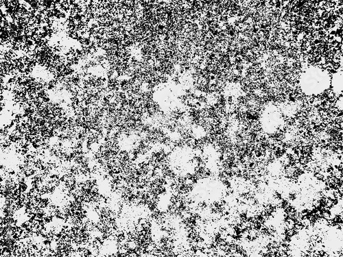 A black and white vector texture of distressed, urban, grungy concrete with aged and weathered damage. Ideal for use as a background texture or for applying grunge effects to your images.