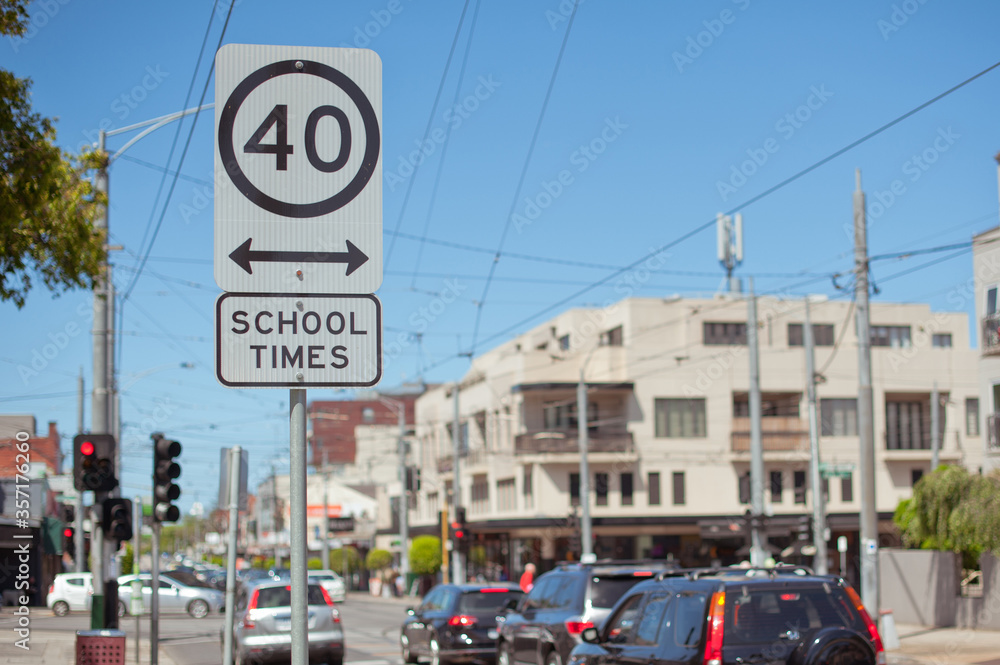 Road sign school zone. Australia, Melbourne. City street.