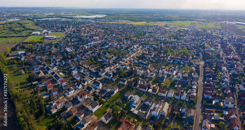 Aerial view of the city Kronau in Germany on a sunny spring day during the coronavirus lockdown.