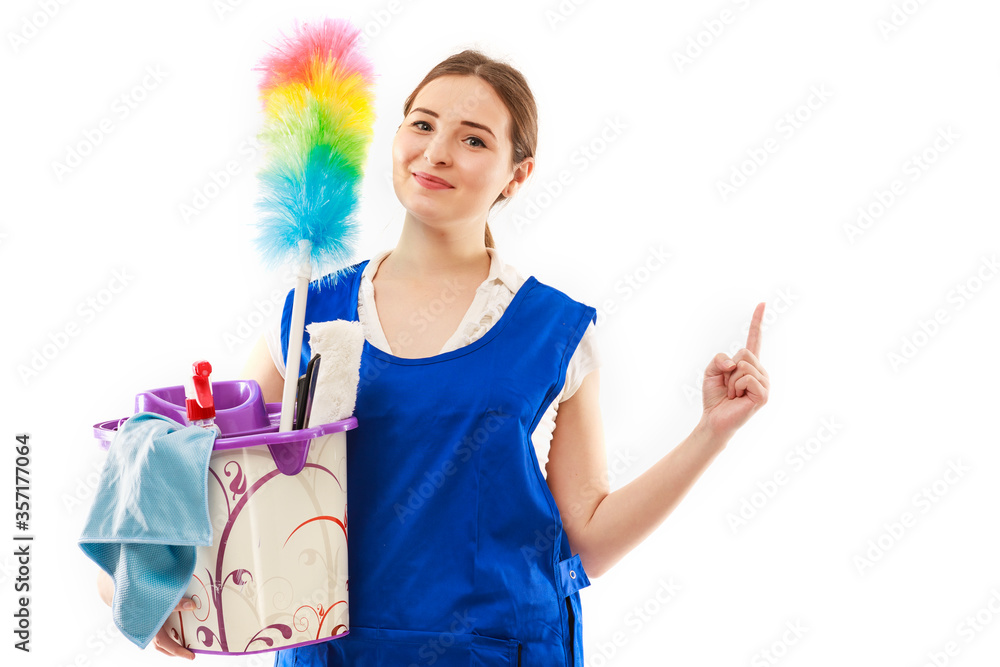 Cleaning woman pointing and showing your product or text isolated on white background. Cleaning woman pointing and showing your product or text isolated on white background.