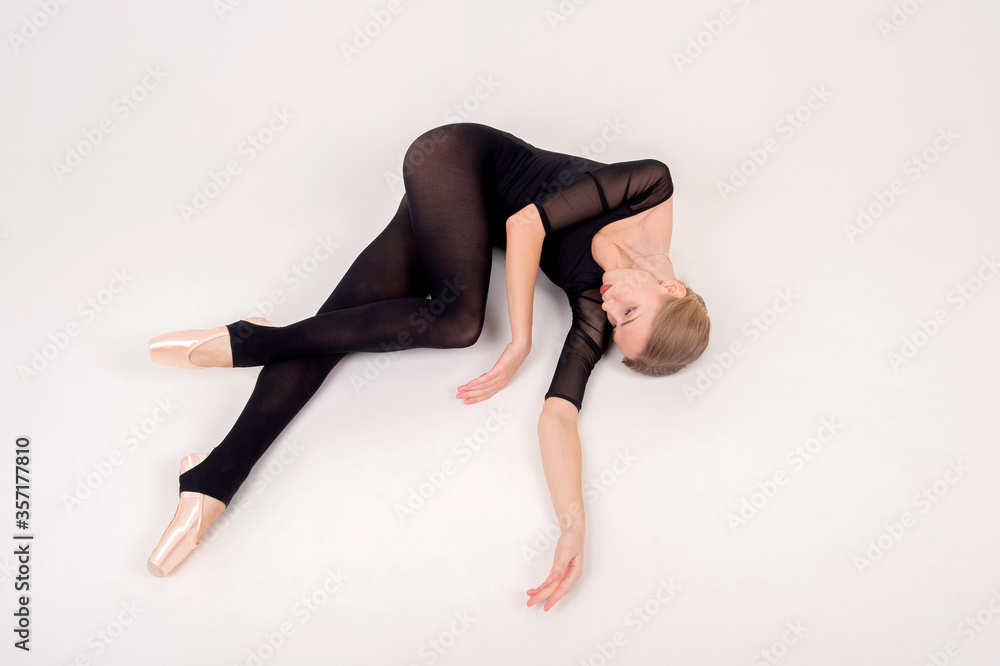Beautiful flexible girl gymnast over white background Beautiful flexible girl gymnast over white background