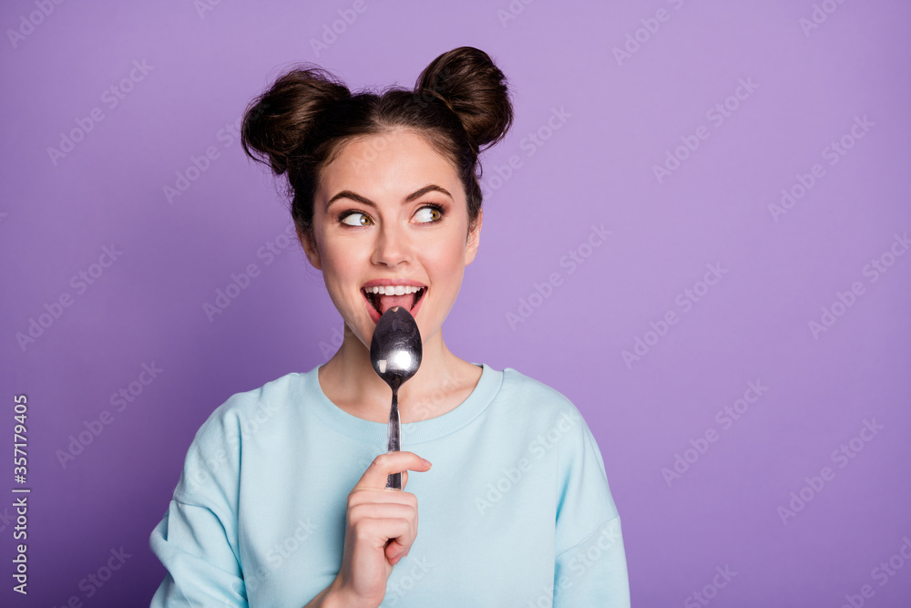 Close-up portrait of her she nice attractive pretty hungry cheerful dreamy girl licking spoon fantasizing menu dessert isolated on violet purple lilac bright vivid shine vibrant color background Close-up portrait of her she nice attractive pretty hungry cheerful dreamy girl licking spoon fantasizing menu dessert isolated on violet purple lilac bright vivid shine vibrant color background