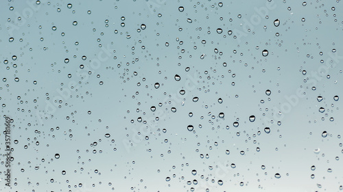 Raindrops on the window close up.