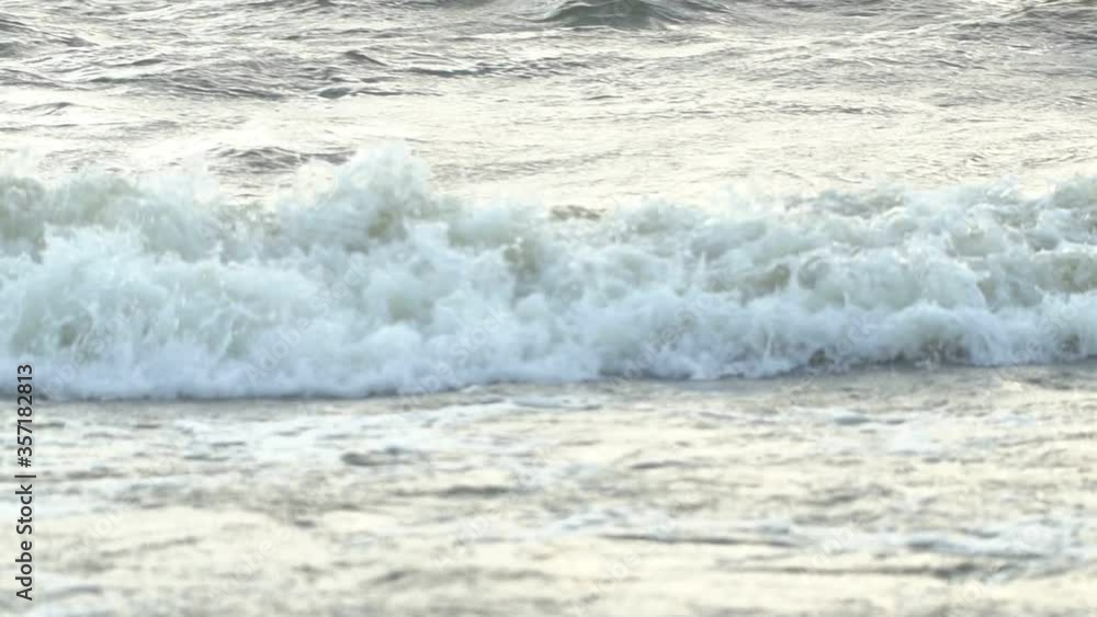 Slow motion waves with texture and wind spray, raw natural wonders Slow motion waves with texture and wind spray, raw natural wonders