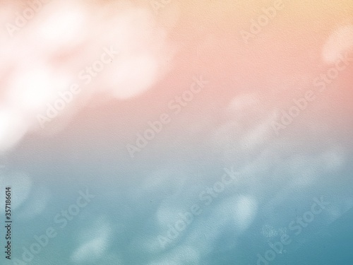 Abstract bokeh background.  Colorful circle bokeh background.  Tree shadows on the wall.  Tree shades  shadows and light.