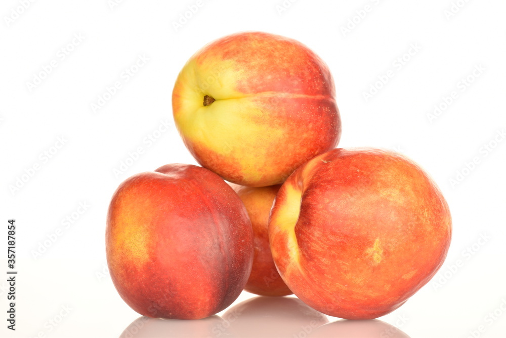 Ripe juicy organic nectarine, macro, on a white background. Ripe juicy organic nectarine, macro, on a white background.
