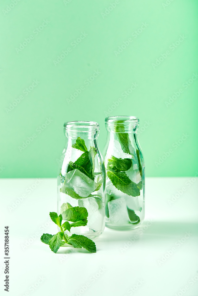 Fresh lemonade with mint in glasses Fresh lemonade with mint in glasses